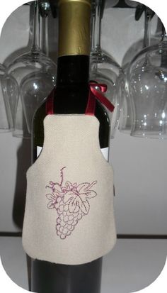 a wine bottle with a cork holder attached to it