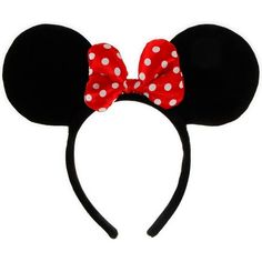 a minnie mouse ears headband with red and white polka dots on the ears,