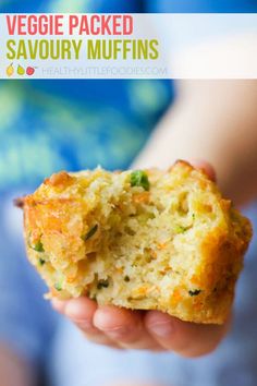 a person holding a muffin in their hand with the words veggie packed savory muffins