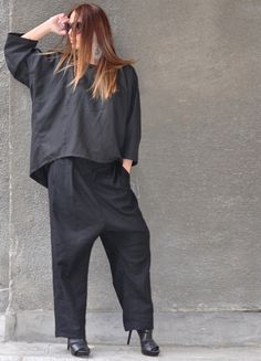 Black Linen Two Piece Outfit with Drop Crotch Pants and Wide Linen Blouse.  Wide Leg Pants Set is so comfy and easy to wear at the same time a touch of elegance and style. Handmade with care in a Pet-free and Smoke-free environment! Made of : 100% Linen The model wears size M - 5,6' / 170 cm Available Size: XS, S, M, L, XL, 2XL,3XL, and custom order. CARE Machine Wash 30oC Hand Wash with warm water Medium hot iron Tumble Low Hang to Dry for Best Results Thank you for visiting my shop. www.EUGfas Casual Ankle-length Pants Sets For Work, Chic Relaxed Fit Sets With Pockets, Relaxed Fit Long Sleeve Pant Set With Pockets, Casual Sets With Pockets And Straight Pants, Relaxed Fit Straight Pants Set For Office, Casual Workwear Sets With Trousers, Casual Workwear Trousers Set, Casual Relaxed Fit Pant Set For Work, Casual Sets With Relaxed Fit Ankle-length Pants