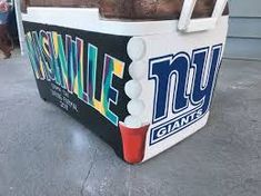 a cooler with the giants logo painted on it