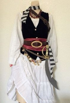 a mannequin is dressed up as a pirate costume with an attached belt and necklace