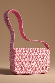 Find ANTHROPOLOGIE Fiona Beaded Bag on Editorialist. The Fiona Beaded Bag is a small shoulder bag crafted from polyester, cotton, and acrylic. It features beaded embellishments and a top handle. This bag can be worn on the shoulder. Pink Beaded Bag, Staud Bags, Plastic Canvas Bag, Daisy Pillows, Embellished Bags, Unique Purses, Beaded Bag, Beaded Handbag, Evening Handbag