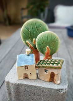 Transform your outdoor space into a magical oasis with these DIY fairy garden pottery ideas! From whimsical planters to charming decorations, learn how to create enchanting pieces for your fairy garden. Get inspired to add a touch of fantasy to your garden with these creative projects. Kids Pottery Gifts, Miniature Ceramic Houses, Tiny Ceramic Houses, Mini Clay House, Pottery Houses Ideas, Mini Ceramic Ideas, Cute Small Clay Ideas, Small Ceramic Projects, Small Clay Sculptures