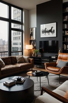 a living room filled with furniture and large windows