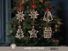 laser cut christmas ornaments hanging from strings