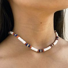 🌊 Dive into Bohemian Beach Elegance! Unveiling our Round White Puka Shell and Orange, Blue, and Beige Coconut Necklace! This piece is a beautiful amalgamation of the ocean's treasures, meticulously crafted to accentuate your bohemian beach style. It's a symbol of adventure, freedom, and a profound connection with nature, making it a perfect companion for beach lovers and adventure seekers. 🏝️ Ocean & Surfer Lifestyle Inspiration: Inspired by the rhythmic waves and the relaxed surfer lifestyle, this necklace is a tribute to the spirit of adventure, exploration, and the natural beauty that the beach embodies. It's a versatile piece that resonates with the thrill of the ocean and the tranquil allure of sandy shores. 🌟 Trendy & Versatile Design: Featuring unique round white puka shells and Bohemian Necklaces For Beach Party, Adjustable Bohemian Necklaces For Beach Party, White Necklaces For Beach Party Season, White Necklace For Beach Party, White Necklace For Beach Party Season, Hippie Blue Necklace For Beach, Blue Hippie Necklaces For Beach, Hippie Blue Necklaces For Beach, Hippie Blue Necklaces For The Beach