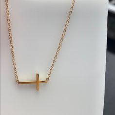 14k Yellow Gold Side-Ways Cross Necklace Adjustable 16-18” Inch Long Chain Cross Size: 1”Inch X 1/2” Inch Elegant Everyday Yellow Gold Cross Necklace, Yellow Gold Cross Pendant Jewelry For Everyday, Everyday Yellow Gold Cross Pendant Jewelry, Elegant Yellow Gold Cross Necklace, Dainty Cross Necklace For Formal Occasions, Formal Clavicle Chain Necklace With Cross Pendant, Formal Cross Clavicle Chain Necklace, Yellow Gold 14k Gold Cross Necklace With Adjustable Chain, Minimalist Cross Pendant Jewelry For Formal Occasions