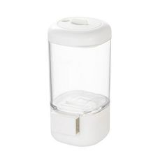 a white plastic container with a lid on the front and bottom, sitting on a white surface