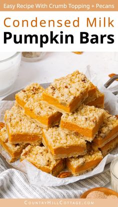 pumpkin bars stacked on top of each other with text overlay reading easy recipe with crumb toppings and pecans