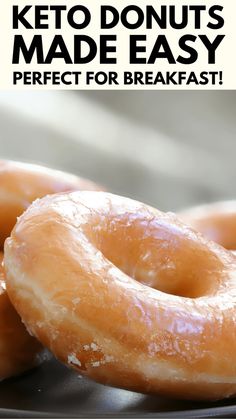 two glazed doughnuts sitting on top of a plate with the words keto donuts made easy perfect for breakfast