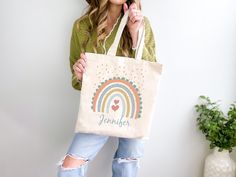 This boho rainbow, hearts, and dots design tote bag can be personalized, giving off a whimsical and fun vibe. Perfect for those who love colorful and unique accessories, this tote bag is great for daily use, shopping, or beach trips. Ideal for those who enjoy expressing their individuality through their accessories. Relevant for birthdays, festivals, and casual outings. Product features - Made from 100% cotton canvas for durability - Flat corners for seamless design - Self-fabric handles with re Fun Personalized Multicolor Bags, Multicolor Personalized Bags For Everyday Use, Personalized Multicolor Bags For Everyday, Fun Everyday Personalized Bags, Playful Personalized Bags For Daily Use, Fun Personalized Everyday Bags, Everyday Personalized Multicolor Bags, Fun Personalized Bags, Playful Personalized Multicolor Bags