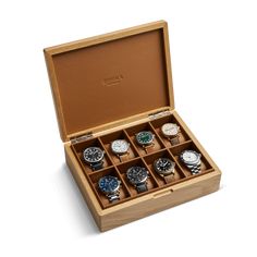 Our wooden watch box is crafted from sturdy oak and features eight separated leather cushions for storing your favorite timepieces, even the large ones. | Shinola Eight Watch Collector's Box | Monogrammable Shinola Detroit, Wooden Watch Box, Leather Cushions, Watch Organizer, Leather Cushion, Wooden Watch, Watch Box, Watch Collection, The Collector