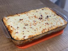 a casserole dish is sitting on the table