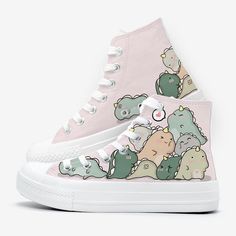 Features: 

Step into the prehistoric era with these Chubby Dinosaurs High Top Canvas Shoes! Whether you're running errands, hanging out with friends, or just want to add some extra cuteness to your shoe collection!
Made with high-quality canvas material so it is more long-lasting and water-resistant. The outsole material is made with rubber, giving it added protection against outside elements such as dirt and water.

**These customized shoes are handcrafted and are only created after an order i Cartoon Print Sneakers With Round Toe, Cartoon Print High-top Sneakers, Fun Low-top Sneakers With Cartoon Print, Fun Cartoon Print Sneakers With Round Toe, Cartoon Sneakers With Rubber Sole And Round Toe, Cute Converse Shoes, Colorful Dinosaur, Cute Converse, Kawaii Dinosaur