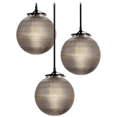 three metal ball lights hanging from the ceiling