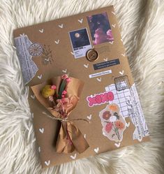 a brown box with flowers and pictures on it