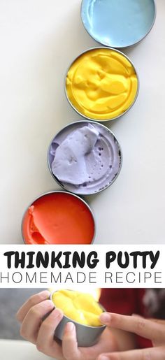 three tins with different colored paint in them and the words thinking putty on top