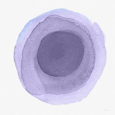 a blue circle painted in watercolor on white paper