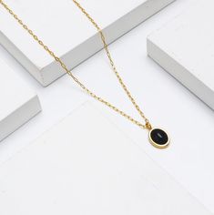 Add elegance to any look with this beautifully crafted necklace. Designed to showcase your timeless and elegant style all year round. Modern Black Formal Chain Necklace, Modern Black Chain Necklace For Formal Occasions, Trendy Gold Plated Round Necklace, Elegant Black Stainless Steel Chain Necklace, Modern Gold Plated Oval Pendant Necklace, Adjustable Plated Necklaces, Black Stainless Steel Clavicle Chain Necklace, Formal Stainless Steel Collar Necklace, Formal Stainless Steel Clavicle Necklace