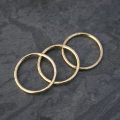 Set of Three 14k gold filled stacking rings. Each ring is hand formed and hammered creating a surface texture to catch the light. Polished to a bright shine. I use durable, high quality 14k gold-fill to make these rings. 14 karat gold-fill has a thick layer of karat gold, not just a microscopic film, as is the case with gold-plated and gold vermeil items. This set of rings will be hand made to order in your size. For more stacking rings: https://www.etsy.com/shop/KiraFerrer/search?search_query=s Hammered Stackable Rings In Recycled Gold, Hammered Recycled Gold Stackable Rings, Hammered Rings, Gold Filled Ring, Stackable Rings, Stacking Rings, Handmade Ring, Gold Vermeil, Band Rings