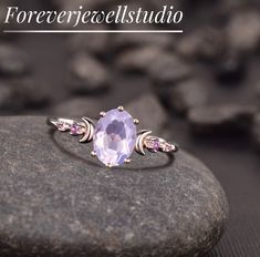 Sterling Silver Lavender Amethyst Ring - Engagement Promise Gemstone Ring Mother's Day Anniversary Birthday Gift For Her Mum Girlfriend Wife *Main stone: Amethyst *Stone Shape: Oval Cut *Stone Size: 8x6mm *Stone Color: Purple Jewelry Type: Designer Ring Metal: 925 Sterling Silver Method: Handmade Personalization: Possible Occasion: Engagement Style: Art Deco Ring Size: We make rings from US 4 to US 10. (If you need smaller or bigger ring size, please ask me to resize) Country of Manufacture: India It's easy to create jewelry that's perfect for you. Change the materials to suit your style. I am happy to quote you the price. IMPORTANT*:- * Customer service is available 7 days a week ** For wholesale discounts please contact me  All jewelry items will come to you nicely packaged inside a fanc Pink Amethyst Anniversary Ring, Pink Amethyst Crystal Ring For Gift, Spiritual Purple Amethyst Wedding Ring, Oval Lavender Amethyst Ring For Gift, Lavender Oval Amethyst Ring For Gift, Lavender Amethyst Ring With Accent Stones, Lavender Amethyst Ring With Oval Shape, Spiritual Amethyst Wedding Ring, Oval Amethyst Promise Ring In Purple