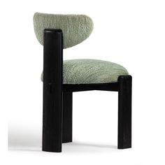 a chair with a black frame and green upholstered fabric on it's back