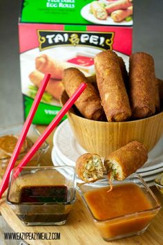 some food is sitting on a table and ready to be eaten with chopsticks