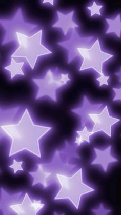 purple and white stars are in the air