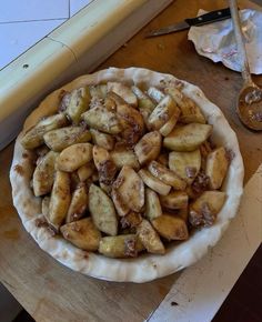 a pie sitting on top of a wooden table