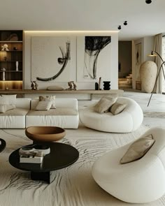 a living room filled with lots of white furniture