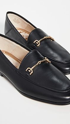 Elegant Leather-lined Slip-ons For Fall, Elegant Flat Slip-ons For Work, Elegant Leather Footbed Slip-ons For Office, Elegant Flat Moccasins For Workwear, Elegant Flat Oxfords For Work, Elegant Flat Oxfords For Business, Elegant Fall Slip-ons With Leather Lining, Classic Slip-on Loafers With Metal Feet, Classic Flats With Leather Sole For Galas