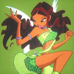 an animated image of a woman with long hair and green dress sitting on the ground