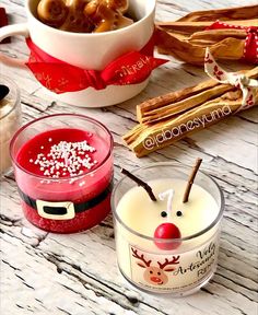 three different types of candles on a table