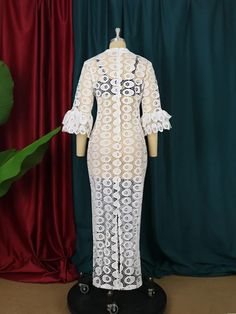 Introducing our African Dashiki Maxi Dress, a stunning fusion of cultural richness and elegant style designed for the modern woman who appreciates the beauty of tradition. This maxi dress features a white lace hollow-out design, adding a touch of sophistication to the vibrant and dynamic Dashiki patterns. The elegant abaya style is perfect for special occasions, parties, or embracing cultural festivities.Crafted with meticulous attention to detail, this dress is a celebration of White Non-stretch Maxi Dress For Beach, Non-stretch White Maxi Dress For Beach, White Non-stretch Maxi Dress For Vacation, White Hollow Out Dress For Wedding, White Hollow-out Wedding Dress, Elegant Maxi Length Hollow Out Dress, Fitted Lace Patchwork Maxi Dress For Beach, Elegant Lace Maxi Dress With Hollow Out Details, Fitted Maxi Dress With Lace Patchwork For Beach