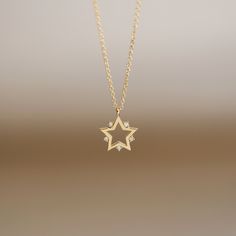 "JSVConcepts Fine Jewelry 14K Gold Star Pendant Necklace with Natural Diamonds / Constellation Star Charm Necklace / Star Pendant Necklace / Diamond Star Pendant ≫ Product Details ◈ Handmade / Handcrafted Fine Jewelry ◈ Pendant Size: approximately 11.70mm x 9.70mm ◈ Diamond: 100% Natural 'Conflict-Free' Diamond ◈ Diamond Carat Weight: .01 ct x 5 pieces = .05 ctw ◈ Diamond Color & Quality: G Color / VS-SI Clarity ◈ Cut: Brilliant Cut ◈ Metal: Solid 14k Gold (18k gold option available upon req Dainty Star-shaped Diamond Necklace For Gift, Gold Star Necklace With Diamond Accents, Gold Star Necklaces With Diamond Accents, Diamond Star Charm Necklace, Gold Star-shaped Necklace With Diamond Accents, Fine Jewelry Star-shaped Diamond Necklace For Anniversary, Star Shaped Diamond Necklace For Anniversary, Star-shaped Diamond Necklace For Anniversary, Gold Star-shaped Diamond Necklace