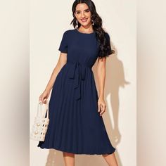 Navy Dress With Slips Back, Pleated Skirt Casual Midi Dress With Pleated Skirt, Casual Pleated Midi Dress, Casual Dress With Pleated Waist, Casual Blue Pleated Dress, Casual Blue Dress With Pleated Skirt, Blue Knee-length Pleated Summer Dress, Blue Midi Dress With Pleated Waist, Blue Knee-length Pleated Dress For Summer, Blue Pleated Midi Dress