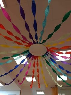 colorful streamers are hanging from the ceiling