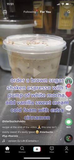 a cup of coffee sitting on top of a table next to an iphone screen with the text, order a brown sugar shaker espresso with pump of white mocha add vanilla sweet cream