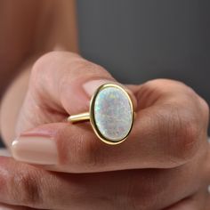 Opal Ring, Vintage Opal Ring, Minimalist Ring, Mother's Day Gift, October Birthstone Ring, Stacking Ring, Gift For Her Elevate any look with our Vintage Opal Ring. This minimalist piece exudes timeless charm, making it a perfect gift for Mother's Day or October birthdays. Crafted with care, its iridescent opal centerpiece adds a touch of elegance to any outfit. Stack it or wear it solo for understated luxury. A beautiful minimalist piece to have in ones collection 🎀 Free Returns and Money-back Fine Jewelry Opal Ring Gift, Fine Jewelry Opal Ring With Round Stone For Gift, Yellow Gold Opal Ring Gift, Opal Birthstone Ring As A Gift, 14k Gold Stackable Opal Ring For Gift, Stackable 14k Gold Opal Ring As Gift, Stackable Opal Ring In 14k Gold For Gift, Fine Jewelry Opal Ring As A Gift, Fine Jewelry Opal Ring For Gifts