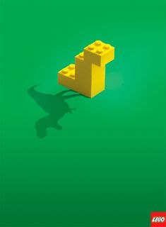 a lego poster with the shadow of a person on it's face and legs