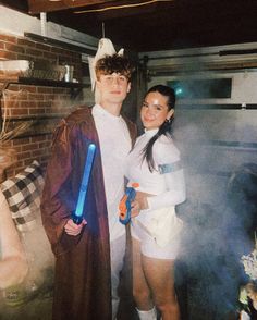 a man and woman dressed up as star wars characters