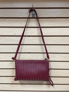 Detachable and adjustable crossbody strap Detachable wristlet strap Zipper closure Interior zip closure pocket 2 interior slip pockets Measures approximately 11" long x 7" high Pre-owned in good condition On-the-go Crossbody Clutch With Zipper, Wristlet Bag, Crossbody Strap, Zipper