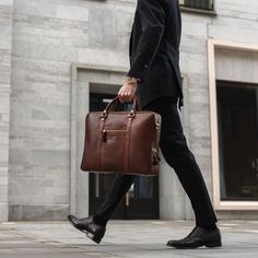 Finding a laptop bag that ticks all the boxes is not easy. We know what it's like. That's why we designed the City Large, a bigger brother of the City. A laptop bag so elegant it can easily accompany you to business meetings and casual enough that you'll want to have it with you every day. When carrying a laptop, functionality is key. But that doesn't mean you need to sacrifice style. City Large has a beautifully slim profile while its very spacious interior has been cleverly designed to fit a r Modern Rectangular Laptop Bag For Workplace, Modern Rectangular Laptop Bag For The Workplace, Modern Briefcase With Laptop Sleeve For Workplace, Professional Laptop Bag With Sleeve, Professional Laptop Bag With Laptop Sleeve, Leather Laptop Bag For Men, Laptop Bag Men, Textile Manufacturing, Leather Office