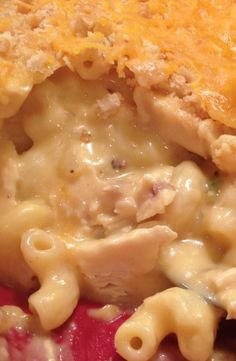 macaroni and cheese with meat on top