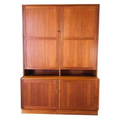 a large wooden cabinet with two doors