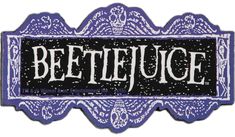 a purple and black belt buckle with the words beetlejuge on it