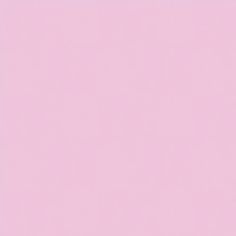 an airplane is flying in the sky on a pale pink background with no people around it