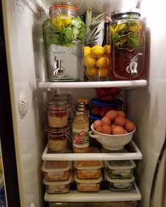 an open refrigerator filled with lots of food