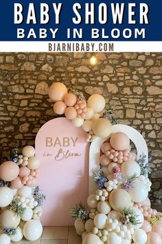 a baby shower is shown with balloons and flowers on the top, and in the bottom